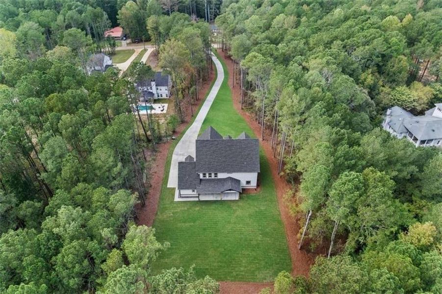 Front exterior of a new home in , Winder, GA, highlighting curb appeal (Image 33).