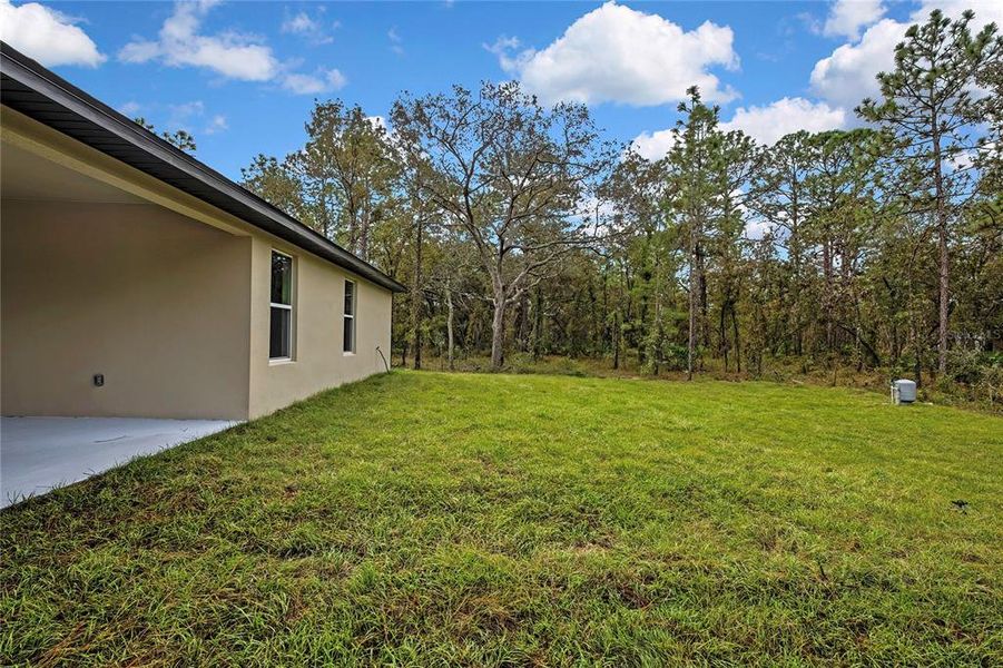 Exterior details and patio area of a home in , Weeki Wachee (Image 36).