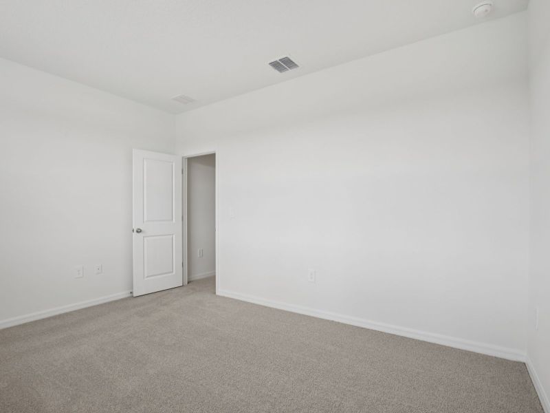 Spacious, unfurnished interior of a new home in Coasterra - Reserve Series, Palmetto (Image 16).