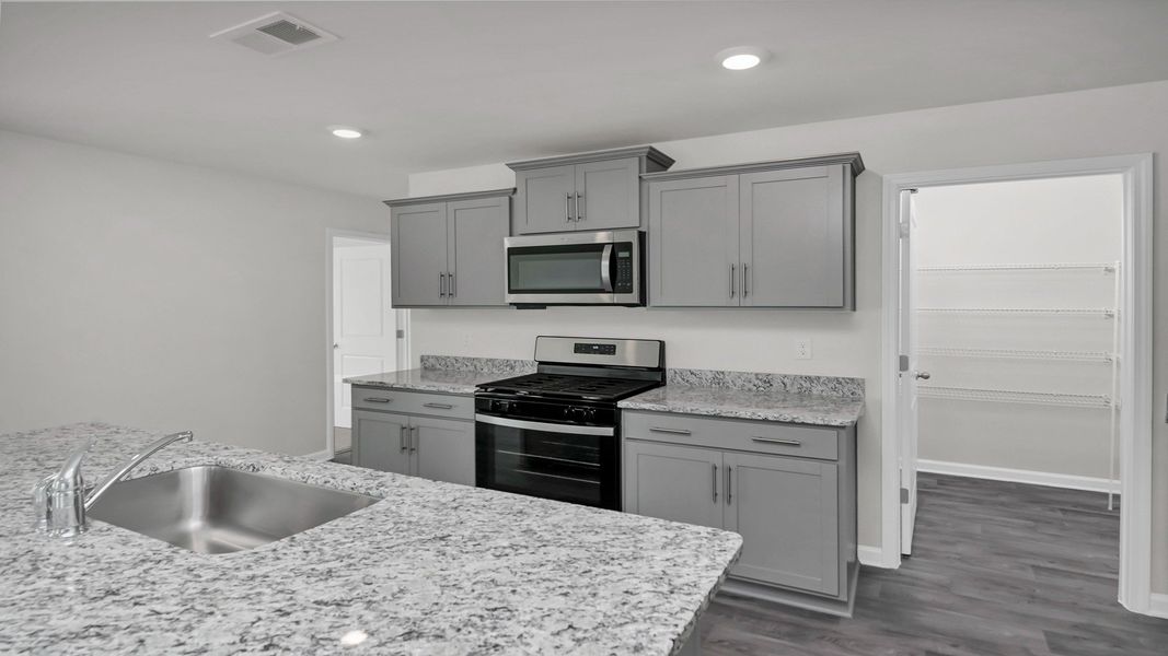 Furnished interior view inside a new home in Grand Oaks, Columbia (Image 8).