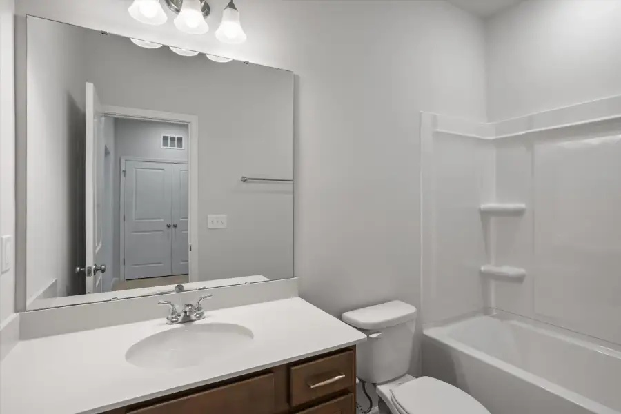 Furnished interior view inside a new home in West Main Townhomes, Sanford (Image 12).