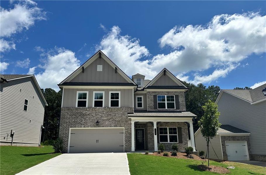 Front exterior of a new home in Summerlin, Winder, GA, highlighting curb appeal (Image 28).