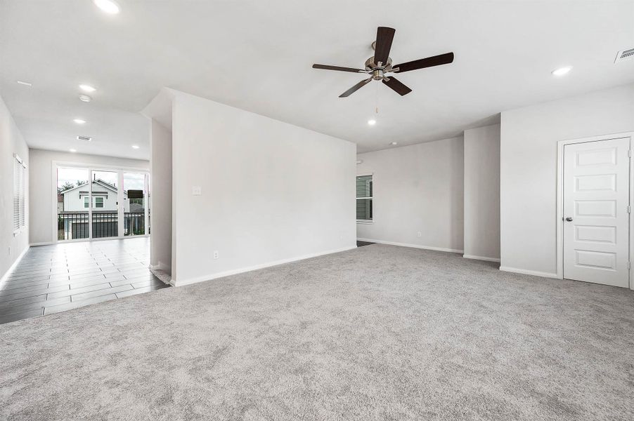 Spacious open-concept living space with easy access to the kitchen. Spacious open-concept living space with easy access to the kitchen.