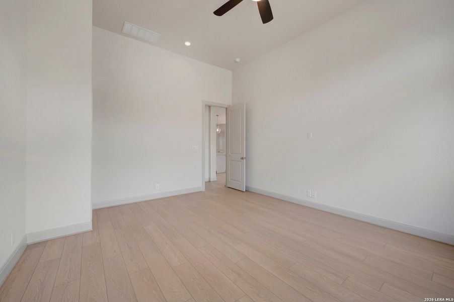 Spacious, unfurnished interior of a new home in Windsong - Legacy Series, Boerne (Image 34).