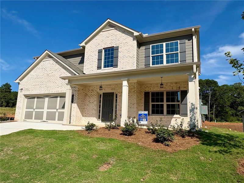 Front exterior of a new home in , Grayson, GA, highlighting curb appeal (Image 17).