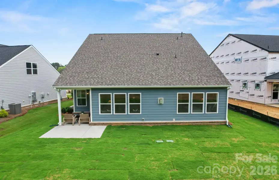 Exterior details and patio area of a home in Riverstone, Monroe (Image 3).