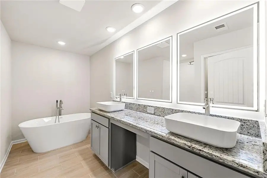 Furnished interior view inside a new home in The Grove At Mundy Mill, Gainesville (Image 10). Furnished interior view inside a new home in The Grove At Mundy Mill, Gainesville (Image 10).