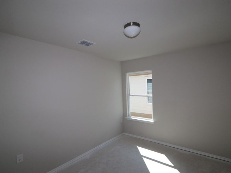 Spacious, unfurnished interior of a new home in Marble Creek Crossing, Austin (Image 9).
