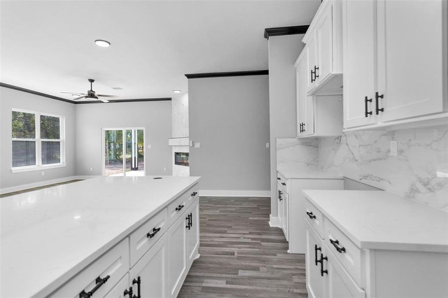 Closer views for cabinet details and backsplash veining.