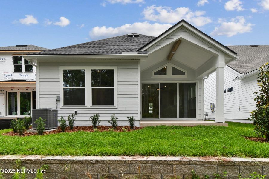 Exterior details and patio area of a home in Reflections 40' Front Load, Ponte Vedra (Image 3).