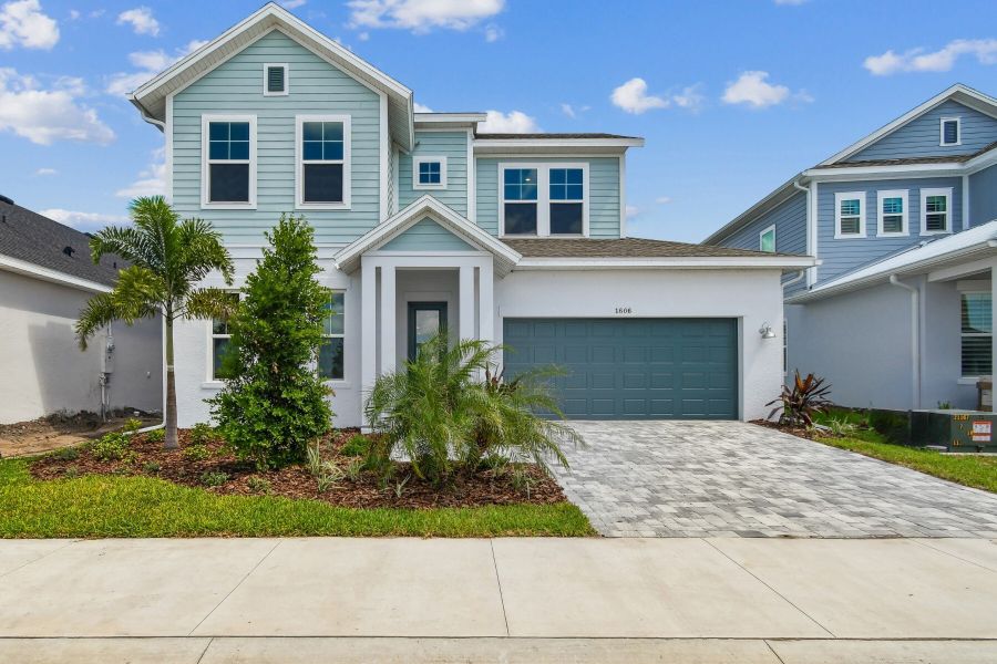 Representative exterior photo of a completed home built from the The Seamount by David Weekley Homes in Emerald Landing at Waterside at Lakewood Ranch – Lake Series, Sarasota, FL (Image 1).