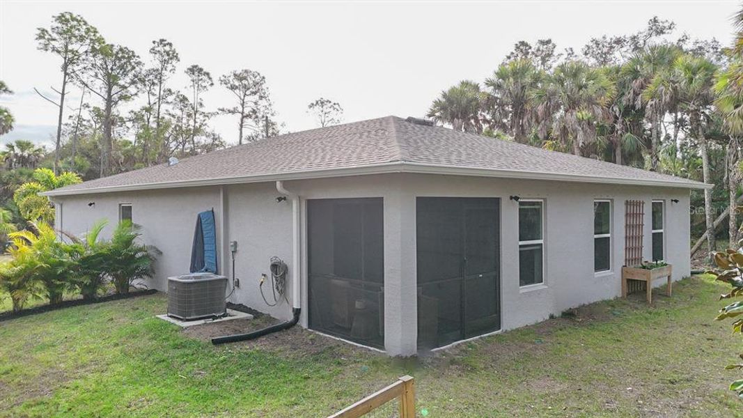 Exterior details and patio area of a home in , North Port (Image 28).