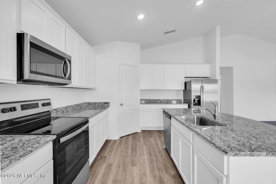 Furnished interior view inside a new home in Rolling Hills, Green Cove Springs (Image 9).