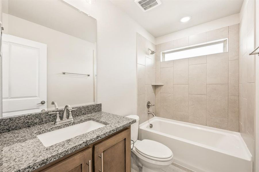 Furnished interior view inside a new home in Creekview Meadows, Pilot Point (Image 30).