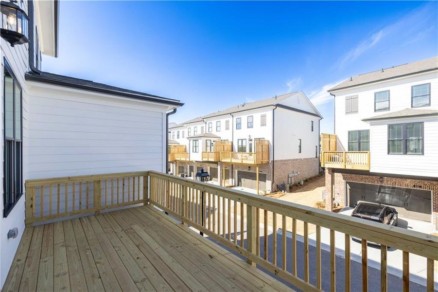 Front exterior of a new home in Palisades Townhomes, Cumming, GA, highlighting curb appeal (Image 25).