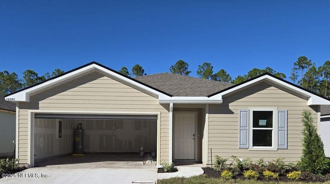 Front exterior of a new home in Copes Landing, Jacksonville, FL, highlighting curb appeal (Image 19). Front exterior of a new home in Copes Landing, Jacksonville, FL, highlighting curb appeal (Image 19).