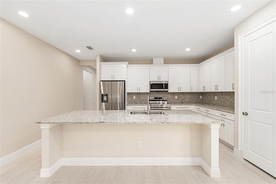 Furnished interior view inside a new home in , Summerfield (Image 13). Furnished interior view inside a new home in , Summerfield (Image 13).