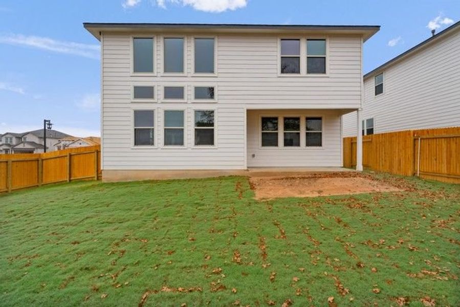 Front exterior of a new home in Morningstar, Georgetown, TX, highlighting curb appeal (Image 6).