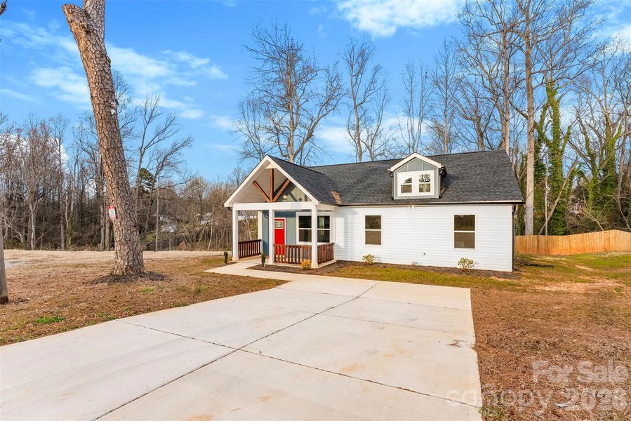 Front exterior of a new home in , Cherryville, NC, highlighting curb appeal (Image 25).