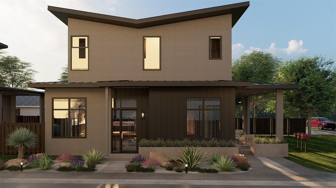 Back of house with stucco siding