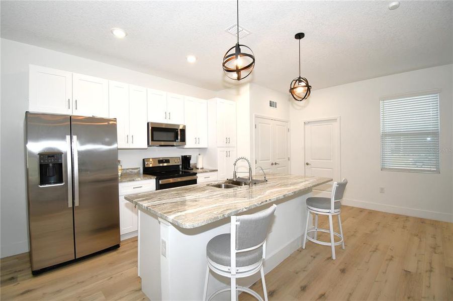 Furnished interior view inside a new home in , Poinciana (Image 11). Furnished interior view inside a new home in , Poinciana (Image 11).