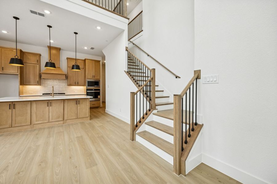 Furnished interior view inside a new home in Newman Village Townhomes, Frisco (Image 11).