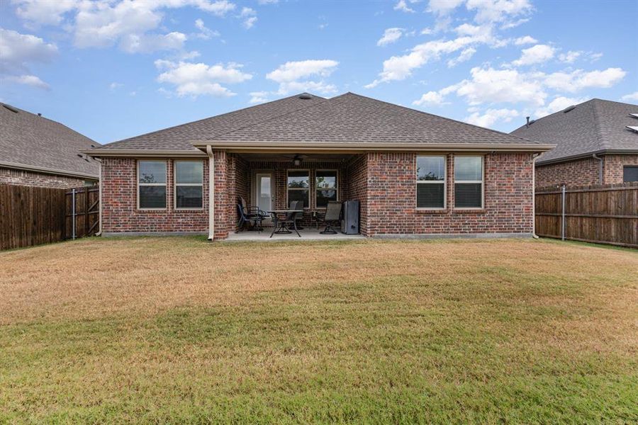 Exterior details and patio area of a home in Trailstone, Caddo Mills (Image 20). Exterior details and patio area of a home in Trailstone, Caddo Mills (Image 20).