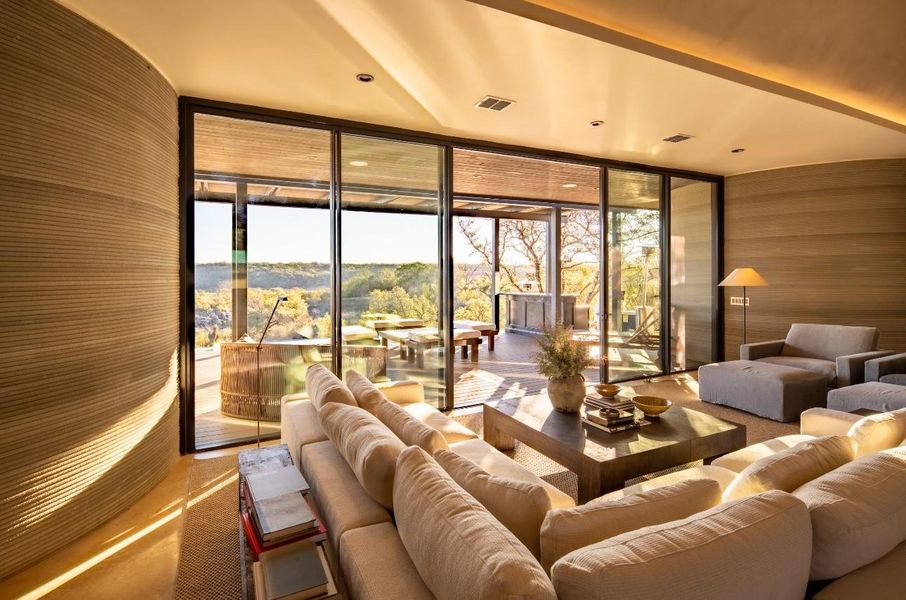 Living room featuring a wall of windows