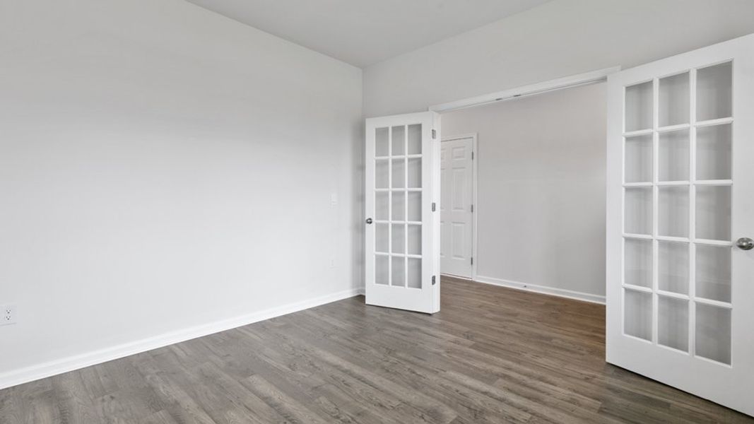 Spacious, unfurnished interior of a new home in Villa Grande, Winterville (Image 15).