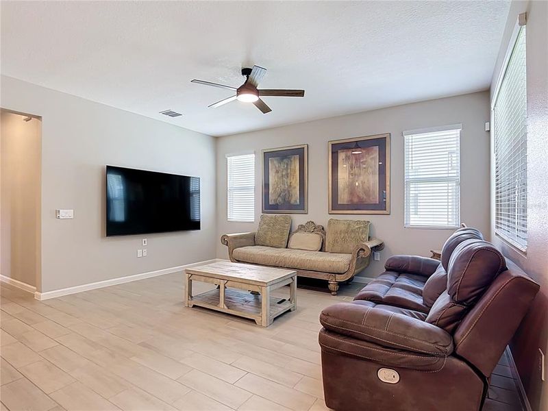 Furnished interior view inside a new home in Seasons at Big Sky, Kissimmee (Image 13).