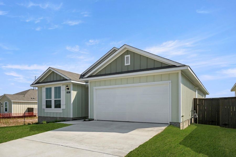 Front exterior of a new home in Cloverleaf, Austin, TX, highlighting curb appeal (Image 21).