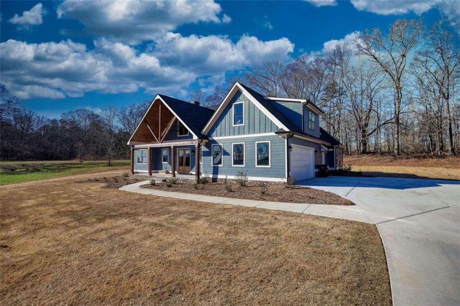 Front exterior of a new home in , Covington, GA, highlighting curb appeal (Image 27). Front exterior of a new home in , Covington, GA, highlighting curb appeal (Image 27).