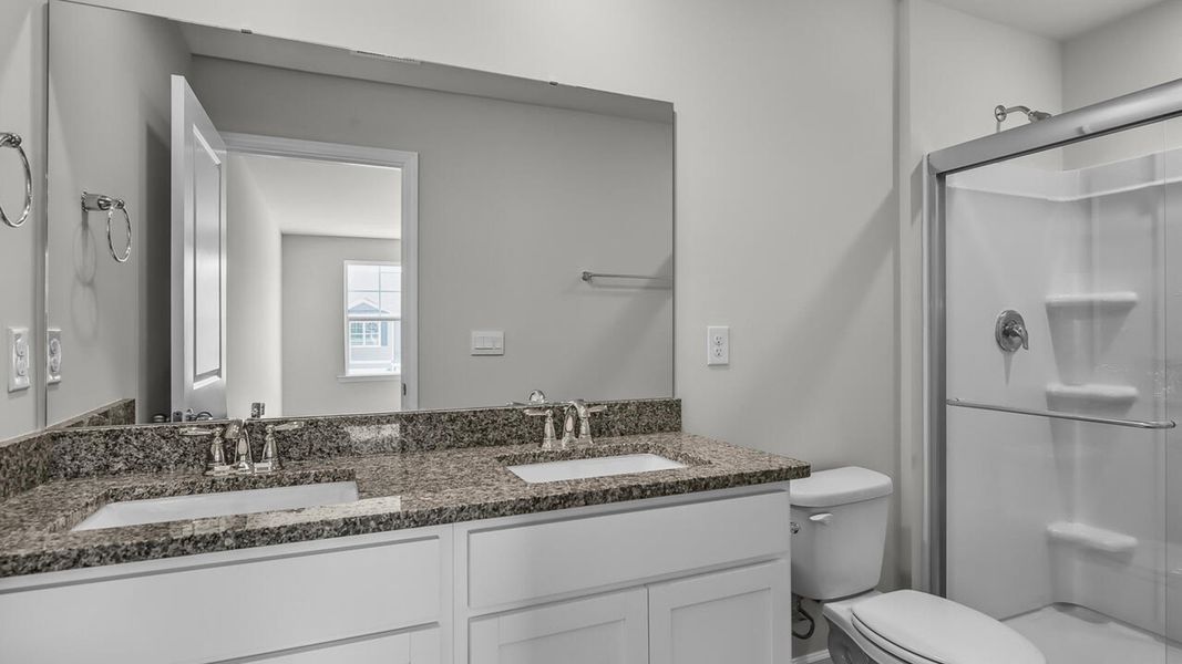 Furnished interior view inside a new home in Grayson Park Duets, Leland (Image 10).