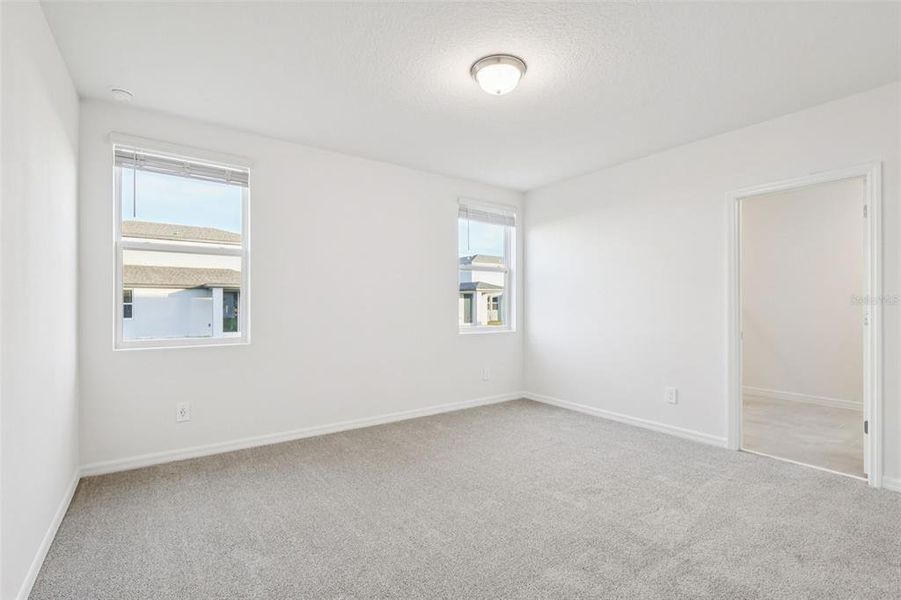 Spacious, unfurnished interior of a new home in The Reserve at Twin Lakes, St. Cloud (Image 29).