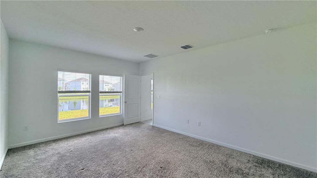 Spacious, unfurnished interior of a new home in Westview, Kissimmee (Image 30).