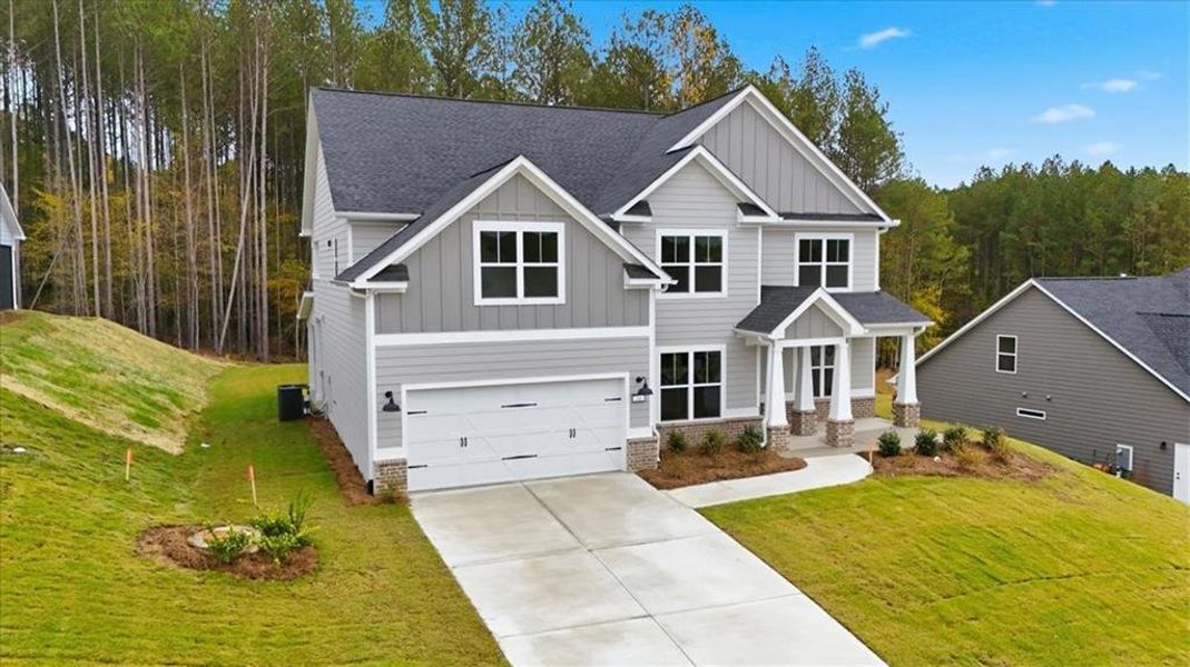 Front exterior of a new home in , Dallas, GA, highlighting curb appeal (Image 18).