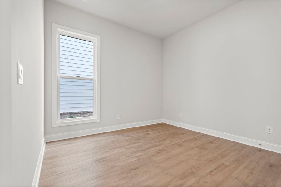 Representative unfurnished interior of a home built from the The Castleberry by The Providence Group in Aberdeen, Hoschton (Image 27).