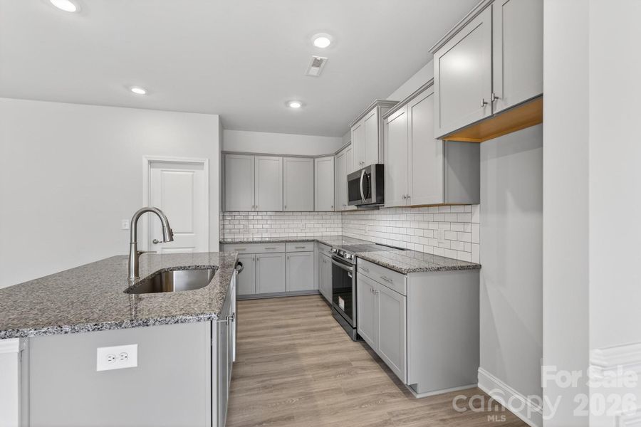 Furnished interior view inside a new home in Crystal Village, Albemarle (Image 8).