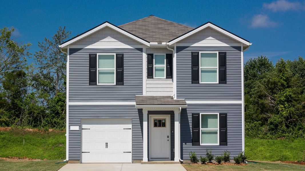 Front exterior of a new home in Parkside Point, Portland, TN, highlighting curb appeal (Image 1).