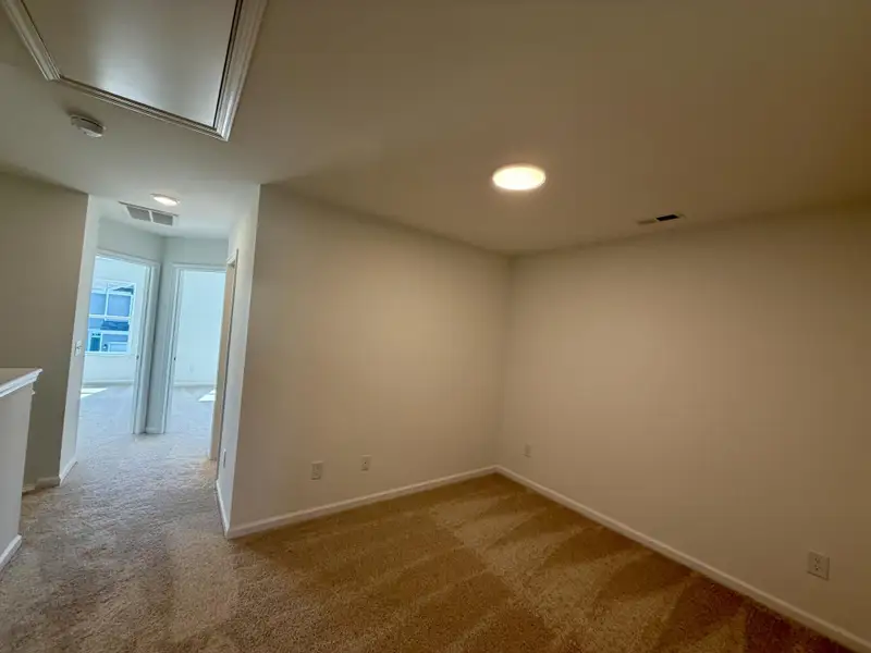 Spacious, unfurnished interior of a new home in Bellevue Townhomes, Greenville (Image 8). Spacious, unfurnished interior of a new home in Bellevue Townhomes, Greenville (Image 8).