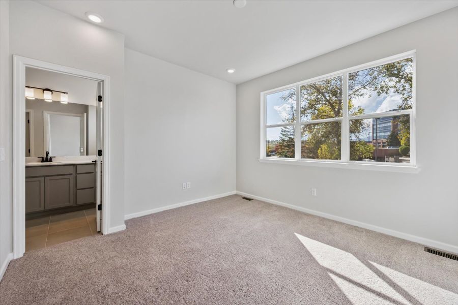 A large empty room with a large window. A large empty room with a large window.