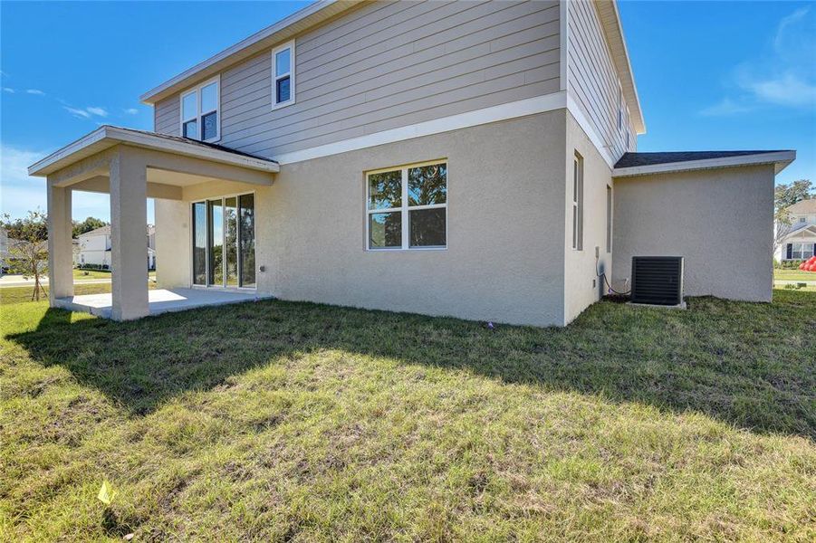 Exterior details and patio area of a home in Seasons at Wekiva Ridge, Mount Dora (Image 4).