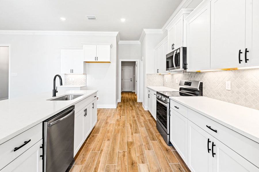 Furnished interior view inside a new home in Natureview, Freeport (Image 6).