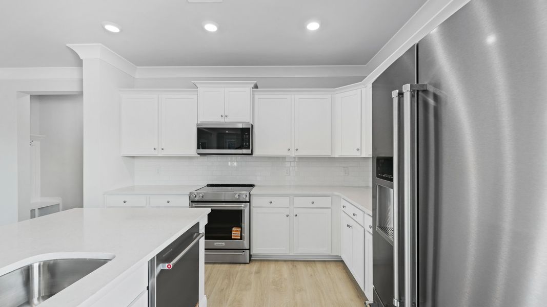 Representative furnished interior of a home built from the SPRUCEWOOD by D.R. Horton in Sheep Island, Summerville (Image 6).