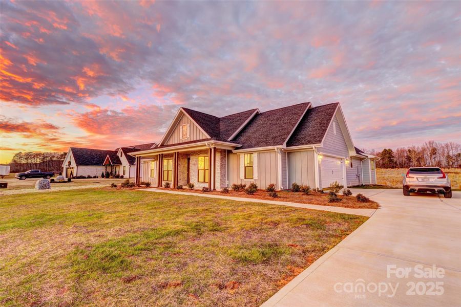 Front exterior of a new home in , Bessemer City, NC, highlighting curb appeal (Image 1). Front exterior of a new home in , Bessemer City, NC, highlighting curb appeal (Image 1).