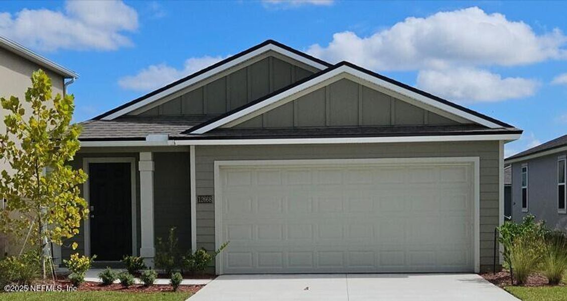 Front exterior of a new home in The Arbors, Jacksonville, FL, highlighting curb appeal (Image 23).