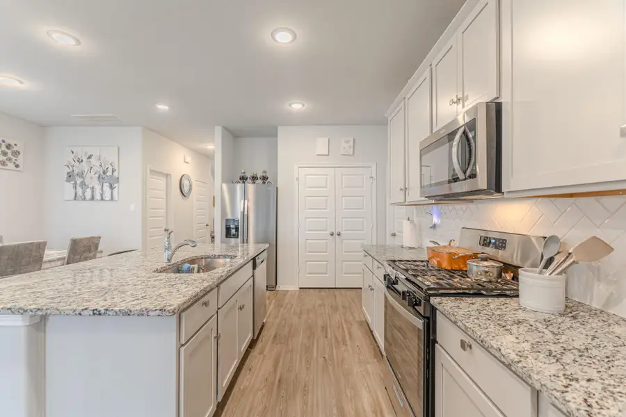 Furnished interior view inside a new home in Lonestar Collection at Aurora, Katy (Image 3). Furnished interior view inside a new home in Lonestar Collection at Aurora, Katy (Image 3).
