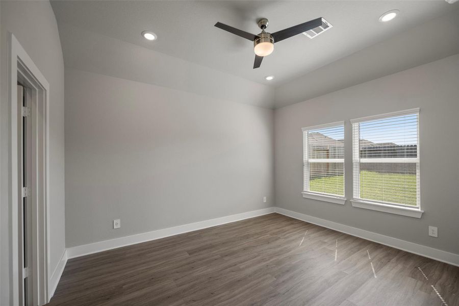 Serene main-level owner’s retreat with soft carpet and plenty of natural light. Serene main-level owner’s retreat with soft carpet and plenty of natural light.