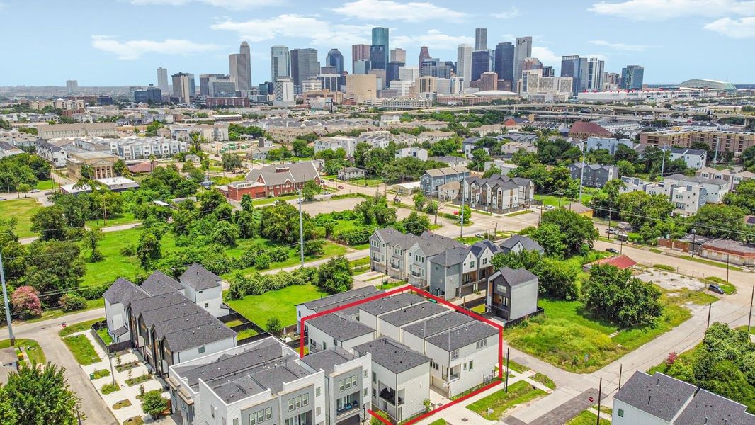 Photo shows six detached three-story homes and the surrounding community. Three homes are currently available for sale — please inquire for more details. Photo shows six detached three-story homes and the surrounding community. Three homes are currently available for sale — please inquire for more details.