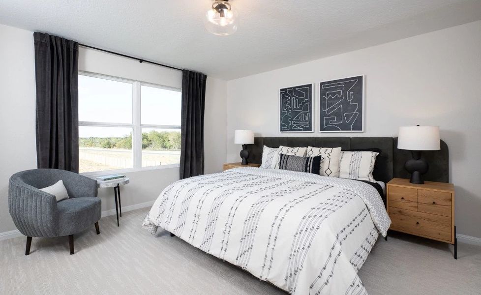 Representative furnished interior of a home built from the Winchester by Ashton Woods in The Trails at Carmel, Pflugerville (Image 13).